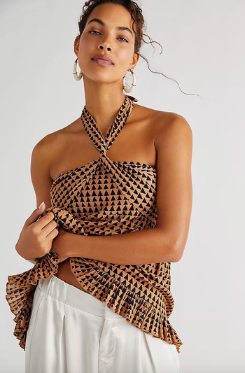 model wearing printed top 