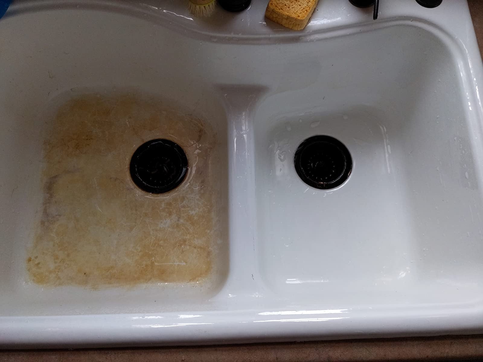 reviewer comparison photo of a sink, with one dirty side and one clean side