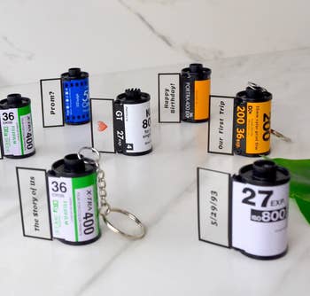 Film rotation  keychains with personalized connection   pull-outs similar  