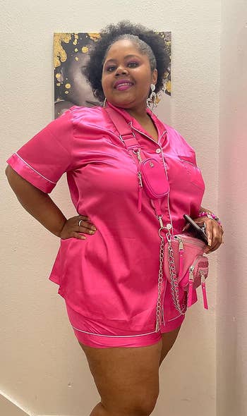 Reviewer wearing the pink pajama set