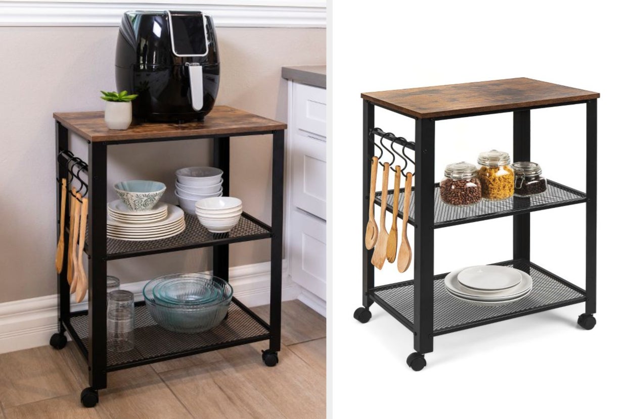 Brown and black wooden and metal microwave cart with S hooks and coffee machine on top, product with dishes and jars of food on shelves on white background