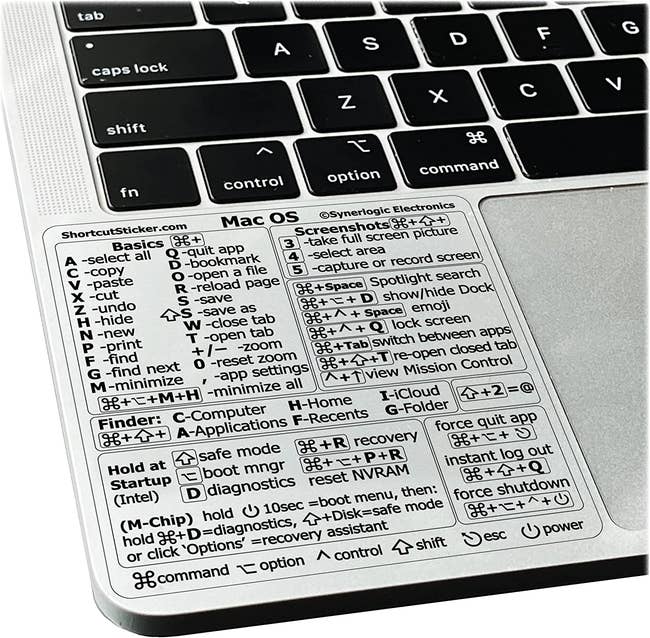 the shortcut sticker on a mac next to the trackpad