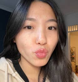 Buzzfeed writer with lip gloss on lips