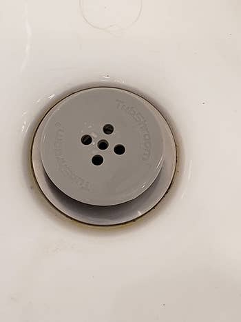 reviewer photo of a gray tubshroom in a drain