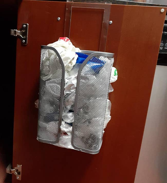 A bag organizer filled with plastic bags