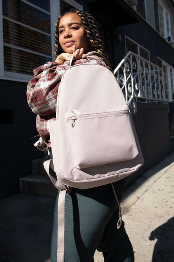 model wearing quartz backpack