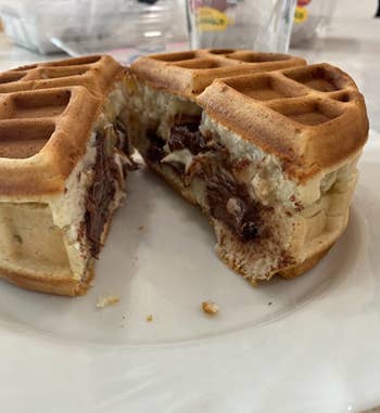Reviewer pic of a waffle stuffed with Nutella 