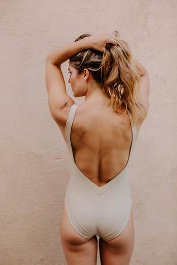 model showing back of swimsuit