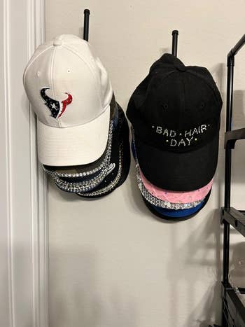 Assorted shot   caps hanging connected  a rack
