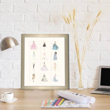 A framed print with 12 illustrations of Barbies 