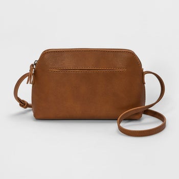 a close up of the crossbody bag in camel