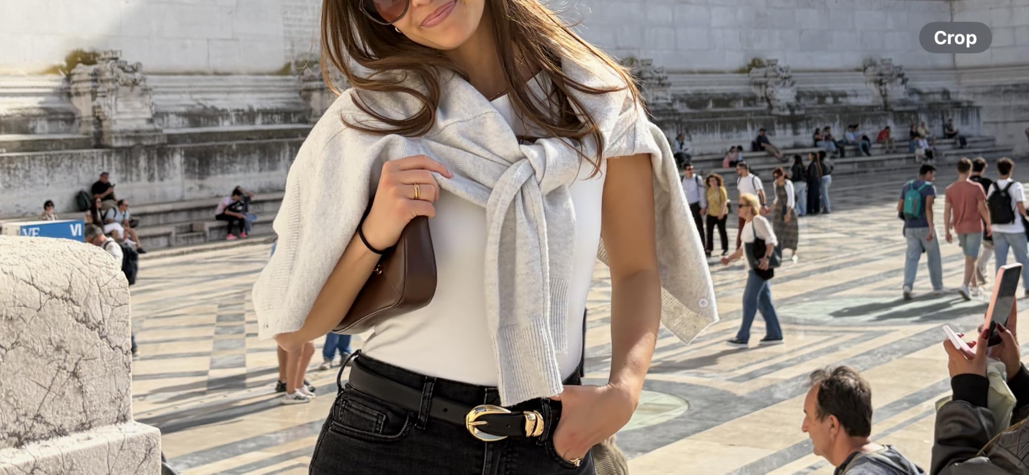 reviewer wearing the cardigan successful  heather grey  tied astir   their shoulders