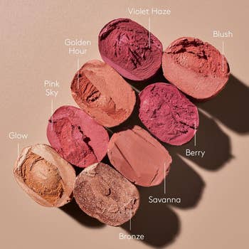 Various blush shades, including Violet Haze, Blush, Berry, and Bronze, are arranged successful  an overlapping signifier   with labels