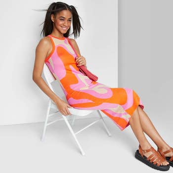 model in orange pink and tan swirl print version