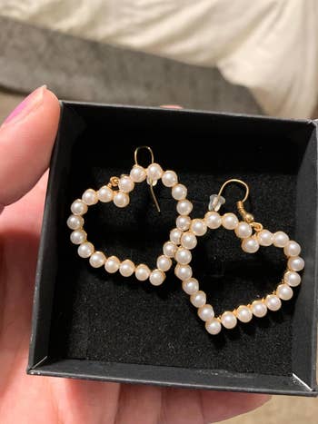 reviewers earrings in a box