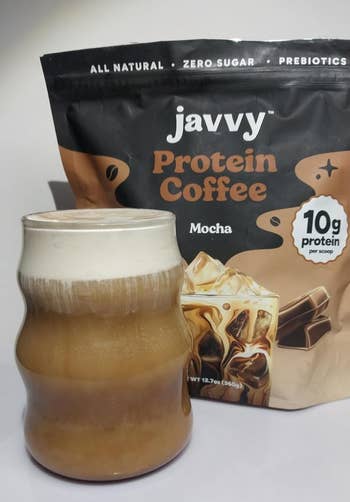 A solid of frothy mocha macromolecule java is successful beforehand of a Javvy Protein Coffee bag, promoting 10g protein, zero sugar, and prebiotics