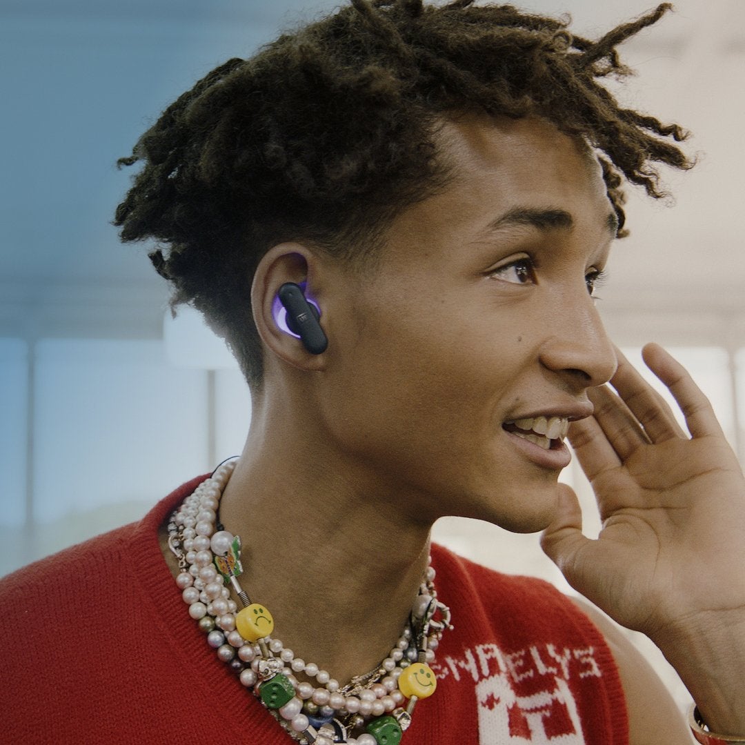 jaden smith wearing the UE FITS earbuds