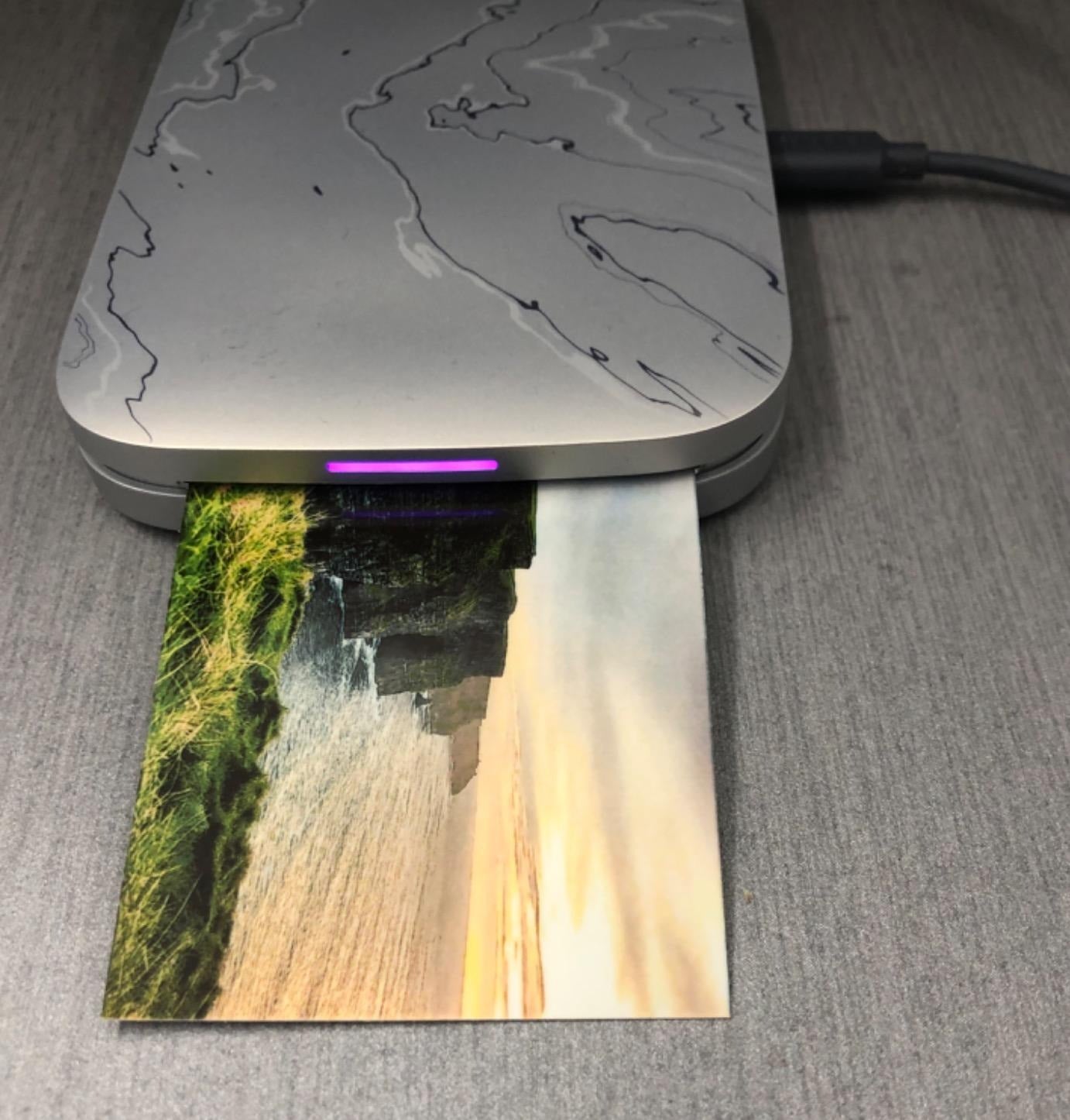 reviewer image of a landscape photo being printed