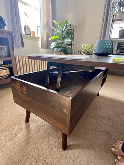 reviewer photo of coffee table with top in lifted position