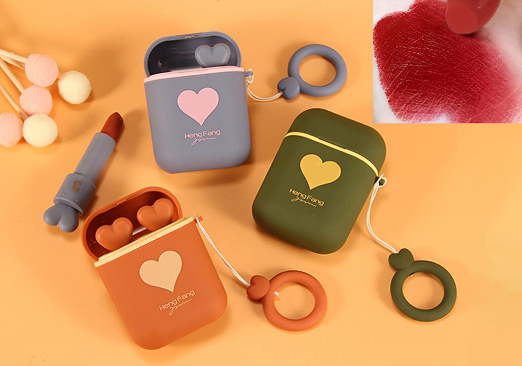 three matte cases with heart topped lipsticks and a little circle on a string for holding
