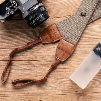 brown camera strap
