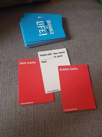 a reviewer photo of the cards from the game