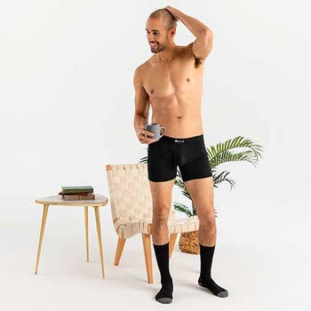 model wearing black boxer briefs
