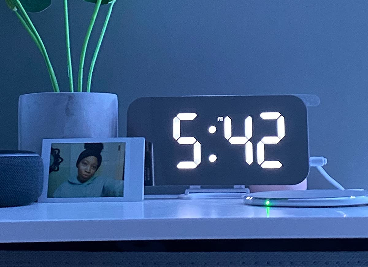 reviewer image of the digital alarm clock on a bedside table