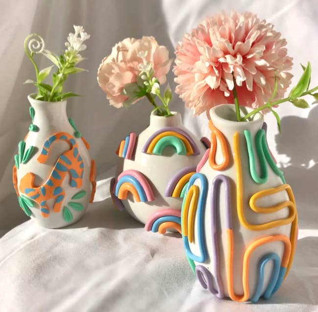 three different styles of the colorful ceramic vases