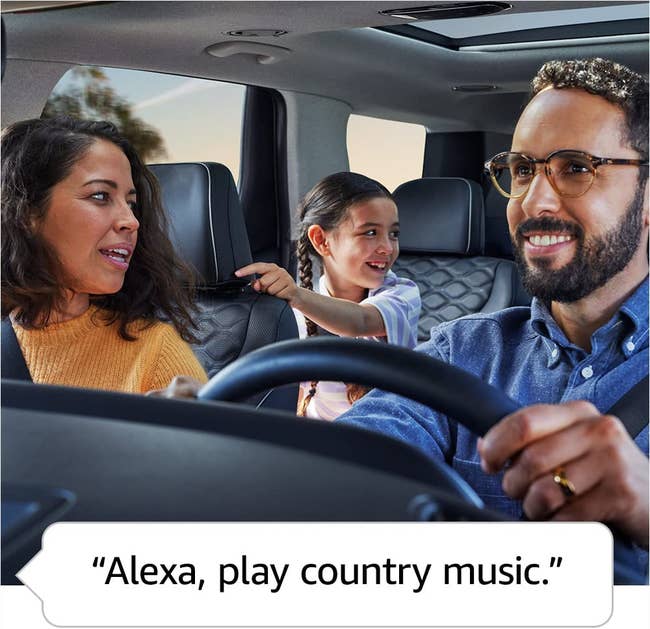 family of three driving in the car with text quote bubble that says alexa play country music