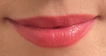 a reviewer photo of their lips after using the lipgloss 
