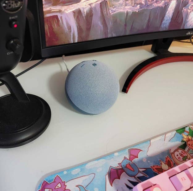 BuzzFeed editor's Echo Dot 4th Gen in Twilight Blue on work desk