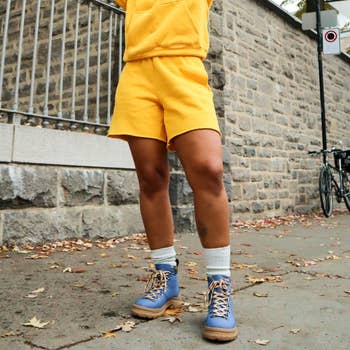 Model wearing the shoe in indigo