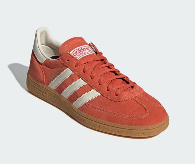 Adidas Gazelle sneaker in red suede with white stripes and gum sole