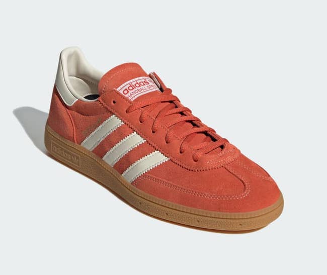 Adidas Gazelle sneaker in red suede with white stripes and gum sole