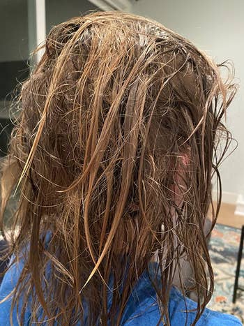 a person with wet and tangled hair