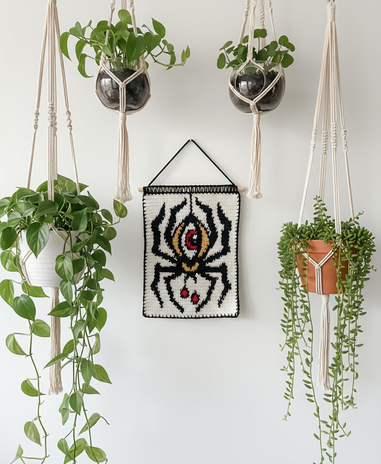 A tapestry featuring a stylized spider design
