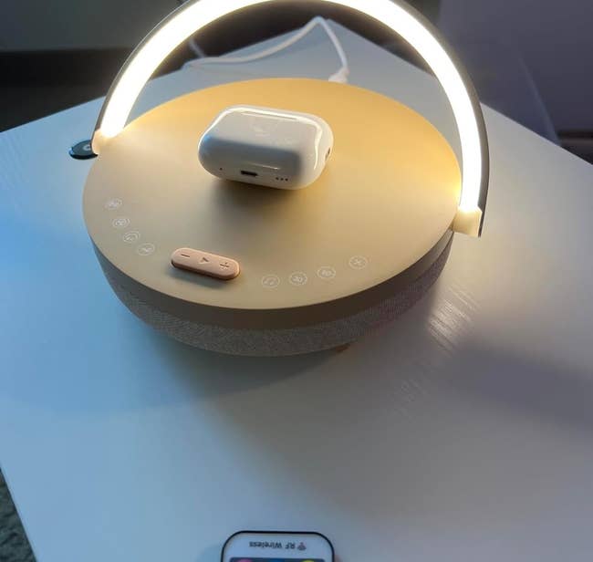 Modern bedside smart lamp with integrated wireless charger and touch controls