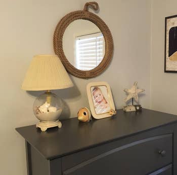 reviewer child's room with rope mirror above dresser 