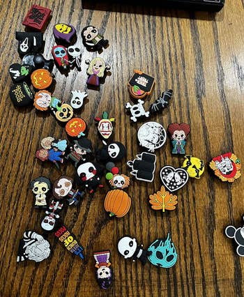 reviewers assorted 40 Halloween themed shoe charms 