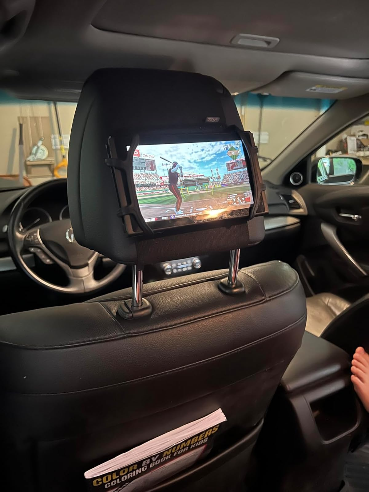 a Nintendo Switch wrong  of a headrest equine   wrong  of a car   