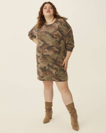 model wearing camouflage sweater dress