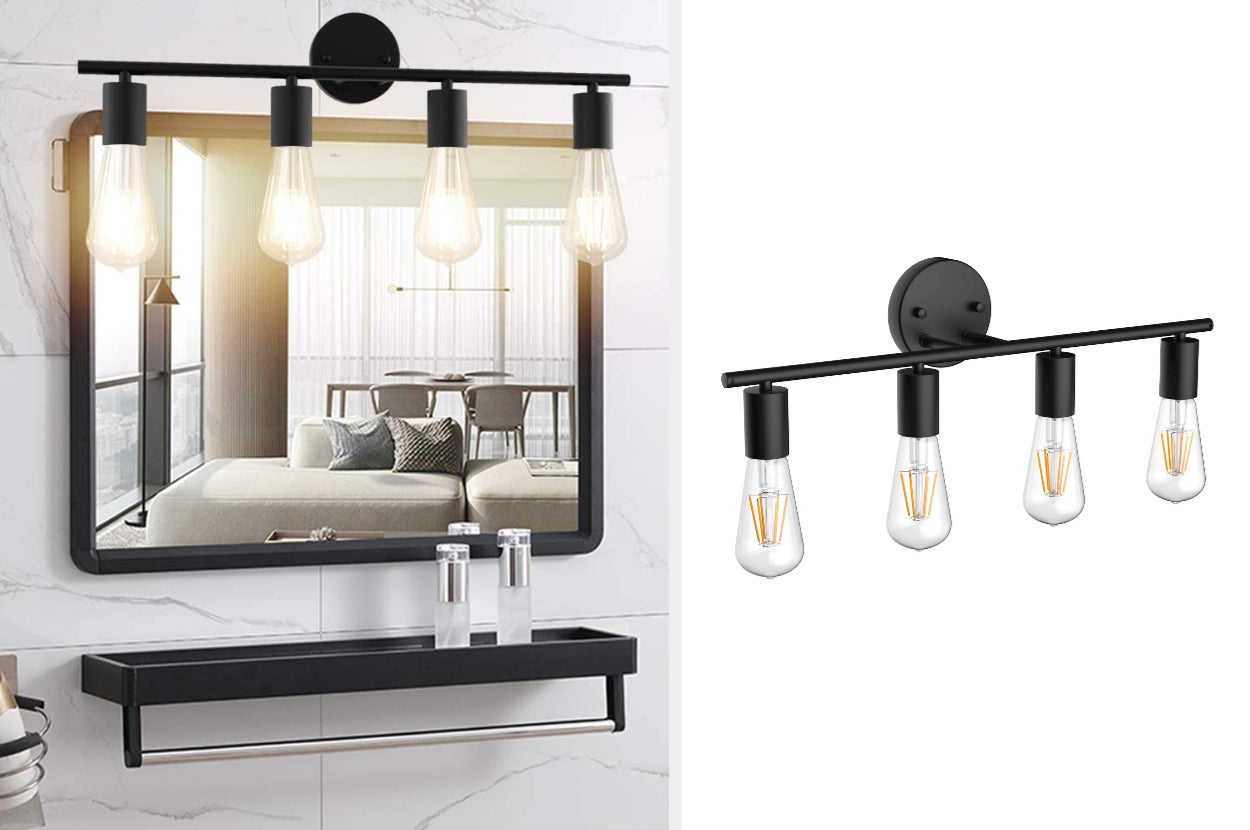 Four black industrial styled overhead lights above mirror on wall with black floating shelf underneath, product on a white background with lights off