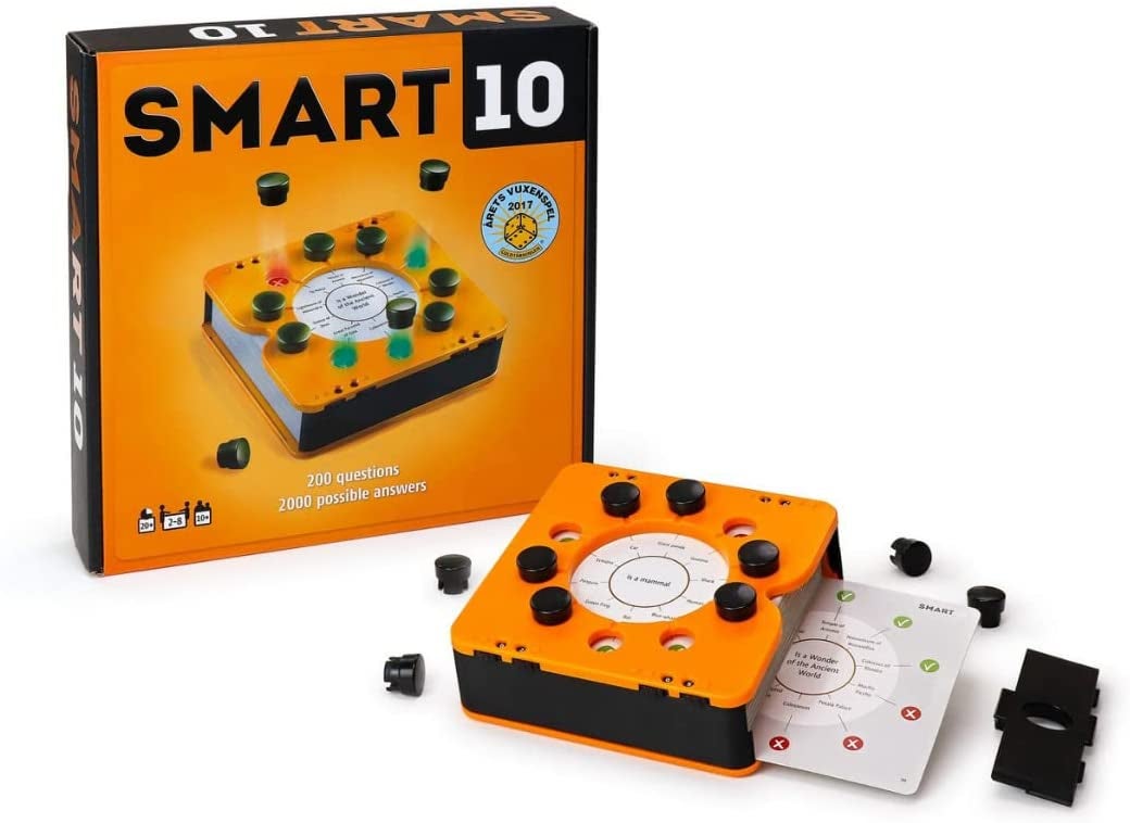 game box and device that stores cards and has removable pegs to reveal answers