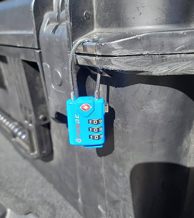 blue lock on a reviewer's bag