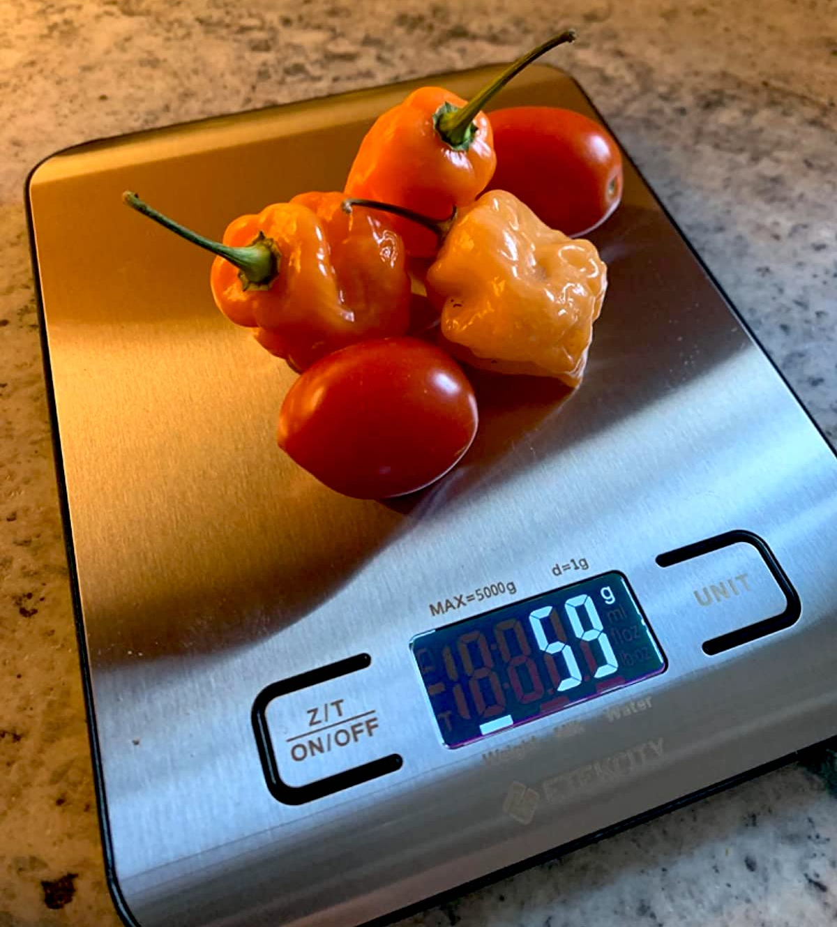 a reviewer photo with peppers being weighed on the scale