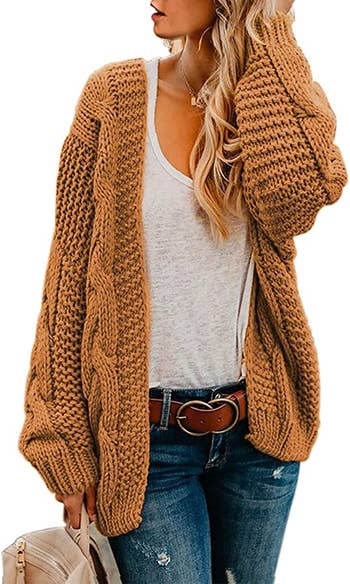 model wearing the sweater in yellow brown