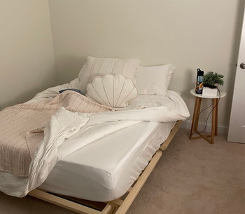 reviewer photo of wooden low profile platform bed