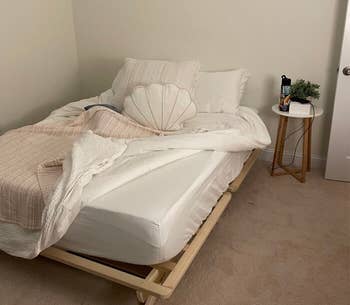 reviewer photo of wooden low profile platform bed
