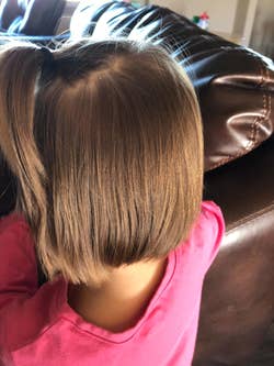 The child's hair smooth and tangle-free